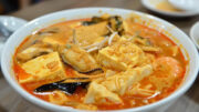 Singaporean curry laska seafood soup